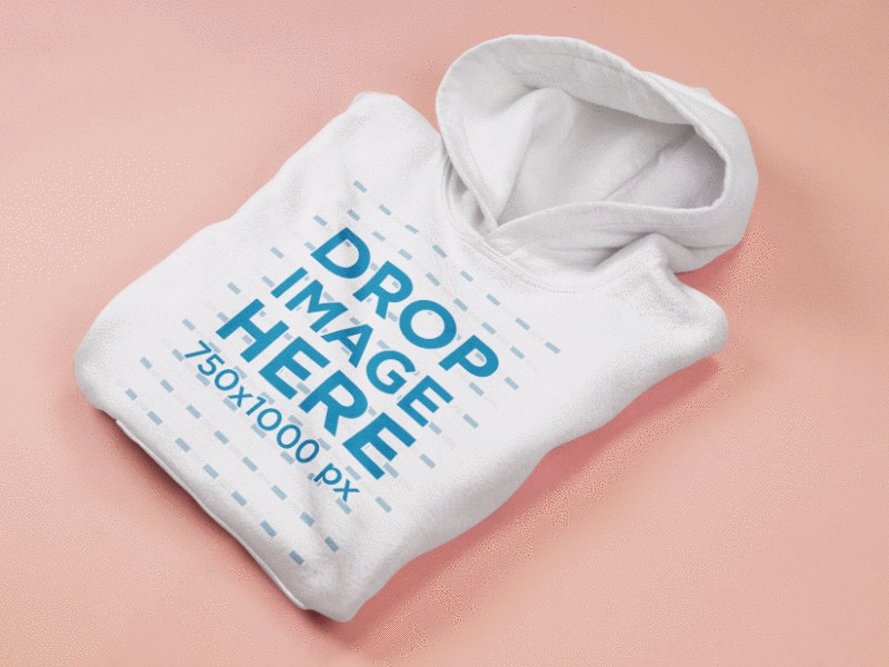 Download Folded Pullover Hoodie Mockup Lying on a Coral Pink ...